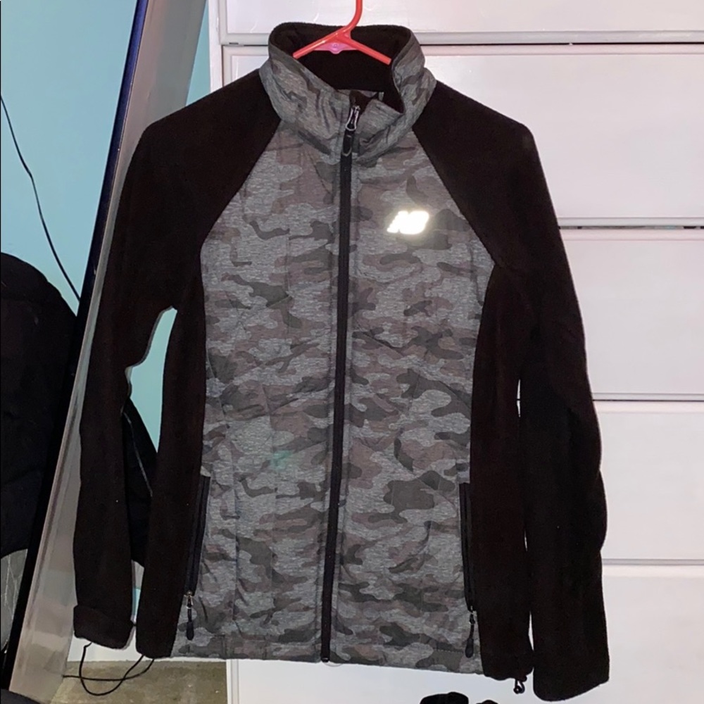 woman’s new balance zip up